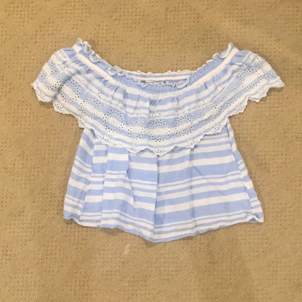 Blue and white top.